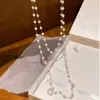 Nuevo Collar Apilado de Doble Capa de Perlas Artificiales Cadena para Clavícula de Moda Exquisita Transfronteriza Cadena para Suéter Estilo Francés de Lujo Ligero