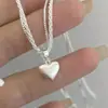Colar Pingente Coração Escovado de Camada Dupla Yuhong Novo Estilo Personalizado Estilo Levemente Luxuoso Nicho High-End Venda Direta da Fábrica