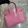 2025 Nova Bolsa Feminina de Couro Genuíno Couro Envernizado Brilhante Padrão Crocodilo Couro Bolsa Platina Portátil de Ombro Transversal Atacado Transfronteiriço