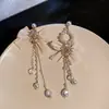 Brincos de Agulha de Prata com Laço e Franja Moda Coreana Brincos de Tarraxa Versáteis Brincos de Nicho de Alta Qualidade Atacado