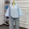 Moda Feminina Transfronteiriça Europeia e Americana Verão 2026 Novo Elegante Gola Reversível Design Solto Nicho Casual Camisa Top