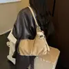 Bolso de hombro vintage de gran capacidad para mujer, nuevo bolso cruzado de otoño 2026, bolso tote versátil de alta gama, bolso tipo empanada