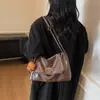 Bolso de Gran Capacidad para Mujer bajo el Brazo 2025 Nuevo Estilo Bolso de Mano Minimalista Francés Texturizado Bolso de Hombro con Cadena Moda Venta al por Mayor