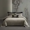 Nuevo juego de cuatro piezas de jacquard hueco de algodón-lino Tencel de alta precisión y lujo sutil, juego de ropa de cama premium para regalo con funda de edredón
