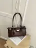 Bolsa de ombro feminina de design transfronteiriço nicho nova de alto valor moda retrô bolsa de trabalho grande capacidade bolsa de ombro único