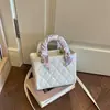 Bolso de mujer de alta gama 2026 nuevo de verano moderno super popular bolso de mano pequeño para el trabajo y uso diario, bolso de hombro y cruzado para commuting