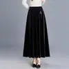 Falda elegante y rejuvenecedora de terciopelo con cintura elástica y dobladillo amplio para mujer, otoño 2026 nueva falda de longitud media de cintura alta, adelgazante, elegante y versátil