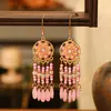 Pendientes Bohemios de Colores de Longitud Media de Yunnan Pendientes Multicapa Suministro Transfronterizo Venta al por Mayor Pendientes de Dopamina