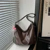 Bolsa de Viaje de Comercio Exterior de Gran Capacidad para Mujeres 2026 Nuevo Otoño Invierno Mochila Retro Pequeña de Nicho Versátil Bolso de Hombro Único