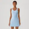 Falda de tenis sin costuras transfronteriza con espalda en U para mujer con almohadillas en el pecho y shorts incorporados, secado rápido, anti-exposición, falda deportiva de golf estilo europeo y americano