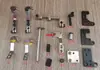 Accesorios para máquinas de bordar por computadora: abrazadera de rosca, cortahilos, placa de montaje de electroimán, eje de cuchilla, manguito de eje, almohadilla de amortiguación