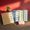 Capas especiais de papel feitas sob medida com páginas internas impressas para pinturas antigas, caligrafia, porcelana, pedras preciosas, jade, vinho e pedras únicas, juntamente com certificados de mestres artesãos especializados em cerâmica de argila roxa