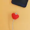Estoque de fábrica Versão Q Boneco Cabeça Grande Cabo de Dados Capa Protetora Silicone Desenho Animado Capa Protetora para Cabo de Dados Comércio Exterior