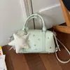 Transfronteiriço 2026 Verão Novo Design de Nicho para o Dia a Dia Moda Versátil Exquisito Sensação de Luxo Bolsa de Ombro Cruzada Estilo Almofada