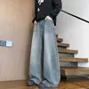 Pantalones Estilo Retro Americano Marca Trendy de Calle Jeans Rasgados con Agujeros Patchwork Pantalones Rectos Sueltos de Pierna Ancha para Hombre