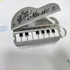 Novo chaveiro de mini piano vertical de desenho animado criativo pode tocar brinquedos de pronúncia interessantes pingente de bolsa infantil