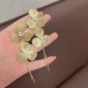 Aretes de Flores de Diseño de Lujo Ligero Estilo Frío Dulces Aretes de Pétalos Frescos Aguja de Plata Metal Flor Hueca Aretes de Borla