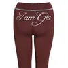 Conjunto de jaqueta curta com zíper e capuz iaiamgia slim fit e calça com estampa de letras e design de costura em contraste