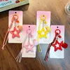 Llavero Colgante Creativo de Pompones de Estrella de Cinco Puntas para Bolsos de Niñas Llavero Acrílico Pequeño Regalo al por Mayor