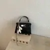 Bolsa Kelly Estilo Coreano Simples para Mulheres, Novo Modelo Primavera 2026, Bolsa de Ombro Feminina, Moda de Nicho, Bolsa de Mão Lisa, Bolsa Quadrada Pequena