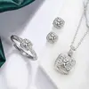 Conjunto de tres piezas de azúcar pequeño pequeño anillo collar colgante pendientes joyería para mujer fabricantes al por mayor simple