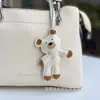Novo Pingente de Bolsa de Urso Bobo Estilo Ins, Acessório de Couro PU Nicho para Carro e Bolsa, Pingente Pequeno de Urso em Couro