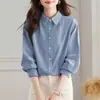 Directo del fabricante: Camisa de mujer estilo francés de manga larga, nuevo modelo otoño e invierno 2026, diseño ajustado, elegante blusa de algodón