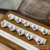 Pingente de Crânio de Osso de Camelo Exquisitamente Trabalhado com Incrustação de Pêssego, Acessório Versátil para Pulseiras DIY, Contas Espaçadoras, Corda Trançada e Pingentes Criativos