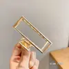 Pinzas para el cabello de alta gama para mujer para la parte posterior de la cabeza, exquisitas pinzas de garra de perla para el día a día, elegantes pinzas de tiburón para salir, venta al por mayor de artículos pequeños de Yiwu