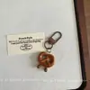 Llavero Colgante de Pan Alcalino Simulado Juguete de Comida de Resina Croissant Bagel Pan Francés Adorno Accesorio de Regalo