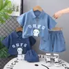 2025 Nueva Ropa Infantil Verano Manga Corta Solapa Oso Inglés Mezclilla Niños y Niñas Conjunto Bebé Color Sólido Conjunto de Dos Piezas