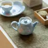Tetera de Cerámica Arita Pintada a Mano con Magnolia Brumosa de las Dinastías Tang y Song, Juego de Té Kung Fu para Uso Doméstico con Filtro de Agujero de Bola y Diseño Floral, Tetera de Mano