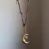 Collar Colgante Luna Dorada Estrella de Ocho Puntas Estilo Metálico Vintage para Mujer Cadena de Suéter Medieval de Nicho Único Accesorios