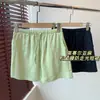 Estilo coreano, sensación relajada, lino de lyocell, refrescante y adelgazante, cintura elástica con cordón, forro anti-exposición, minifalda H060909