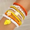 Conjunto de pulseiras de férias estilo boêmio transfronteiriço europeu e americano, pulseira multicamadas com sementes, concha e estrela-do-mar