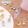 Popular en línea popular joyería para uñas chapada en oro circonita gota de agua joyería para uñas de alta gama exquisita estrella Luna diamante para uñas al por mayor