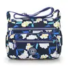 Bolso Cruzado de Hombro Personalizado Nuevo Simple Literario Casual Tela Lavada Impermeable Lona Tela de Nylon Estilo Coreano Bolso de Moda para Mujer