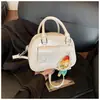 Bolsa de Concha Super Popular Transfronteiriça Feminina 2025 Nova Mais Vendida Estilo Coreano Bolsa de Ombro Texturizada Versátil Bolsa Transversal