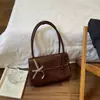 Bolsa de mano de gran capacidad, estilo retro, de alta gama, para mujer, nueva colección 2025, moderna y única, adecuada para ir al trabajo