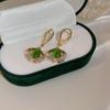 Pendientes de hoja de ginkgo hueca para mujer, nicho, temperamento de alta calidad, lujo ligero, cobre incrustado con circonita, forma de abanico, cierre de oreja de ópalo