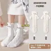 Calcetines de mujer de otoño e invierno de lana coral hasta la mitad de la pantorrilla, modernos y bonitos, transpirables, gruesos y cálidos.