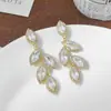 Nuevos Pendientes Largos de Hoja con Circonita 2025, Elegantes y Versátiles, Pendientes Exquisitos y Exagerados con Borlas y Ganchos de Plata S925
