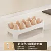 Caixa de armazenamento de ovos de grande capacidade para uso doméstico, projetada para organização de cozinha e geladeira, com múltiplas camadas e uma prateleira de bancada para evitar que os itens caiam