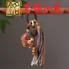 Pingente de cavalo auspicioso pintado de ébano, chaveiro de cavalo do zodíaco Yiming Xianyuan com borla Xizang, decoração de bolsa