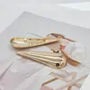 Broche metálico minimalista estilo europeo y americano con forma de lágrima, insignia de pin decorativa de alta gama de lujo ligero para traje de baño