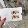 Uñas Portátiles Puras Hechas a Mano Nai Zi Estilo Primavera/Verano Flor Estrella de Cacao en Relieve 3D Pura Vibración de Deseo Estilo Europeo y Americano B376