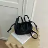 Bolso cubo de gran capacidad para mujer, nuevo modelo de otoño 2026, bolso de hombro exquisito y moderno para el día a día con un toque de alta gama, bolso cruzado
