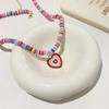 Collar con colgante de corazón en colores dulces y frescos estilo japonés y coreano para mujer, popular en línea, versátil gargantilla/cadena para clavícula con bloques de color dulces y lindos.