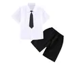 Conjunto de Verão Estilo Academia para Meninos 2026 Bebê Preto e Branco Manga Curta Camisa com Gravata Shorts Conjunto de Duas Peças Lindo Traje Formal