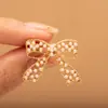Broche nuevo estilo 2025 para mujer, aleación de zinc de alta gama, corsage de nicho, accesorios de ropa frescos y dulces, accesorios de ropa